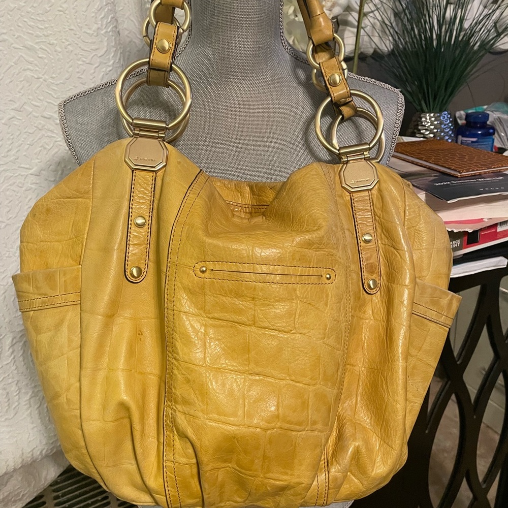Butter soft yellow or mustard color , leather handbag by B Makowsky